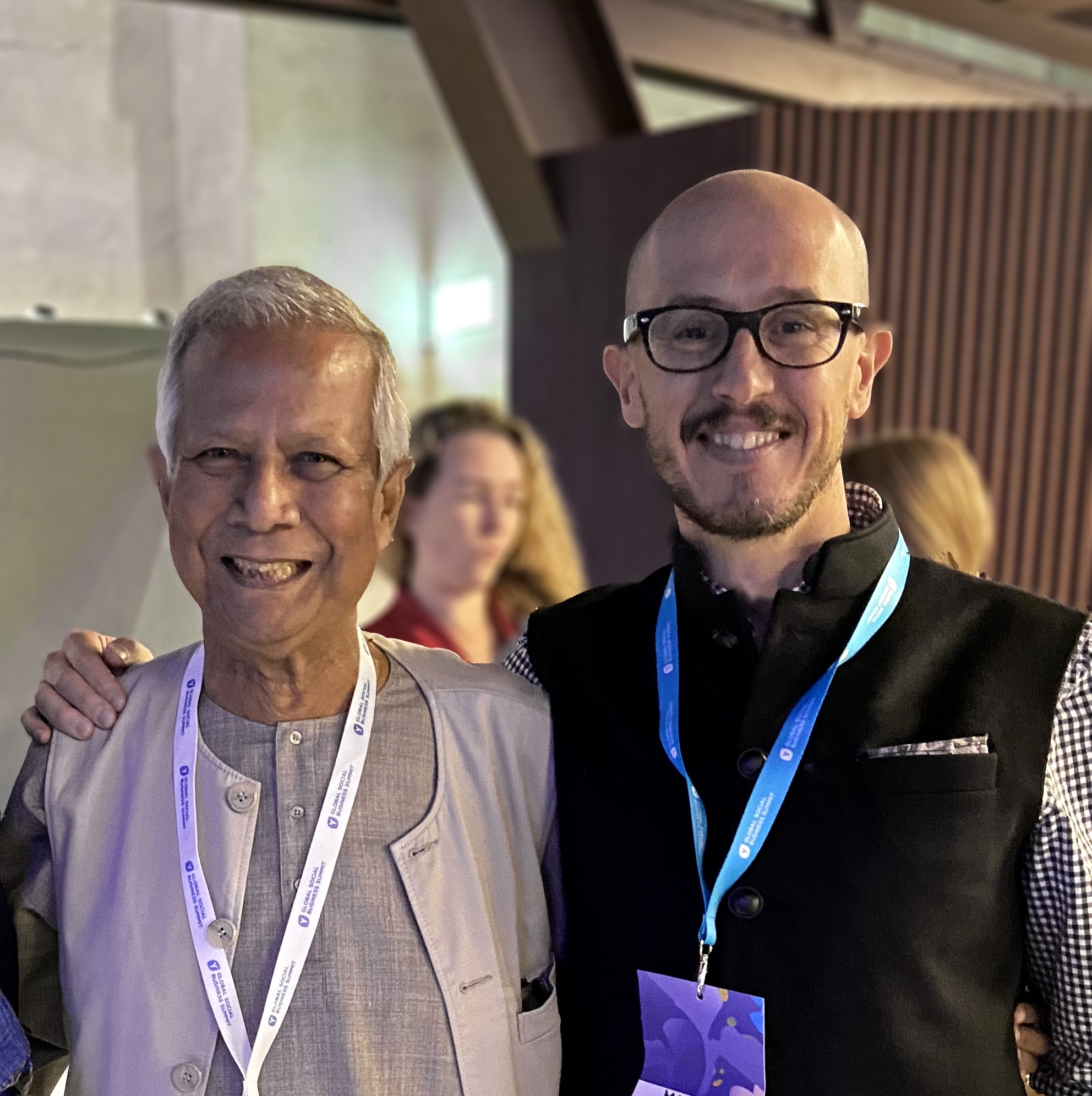 Marco Ferrario with Muhammad Yunus at a global social business summit