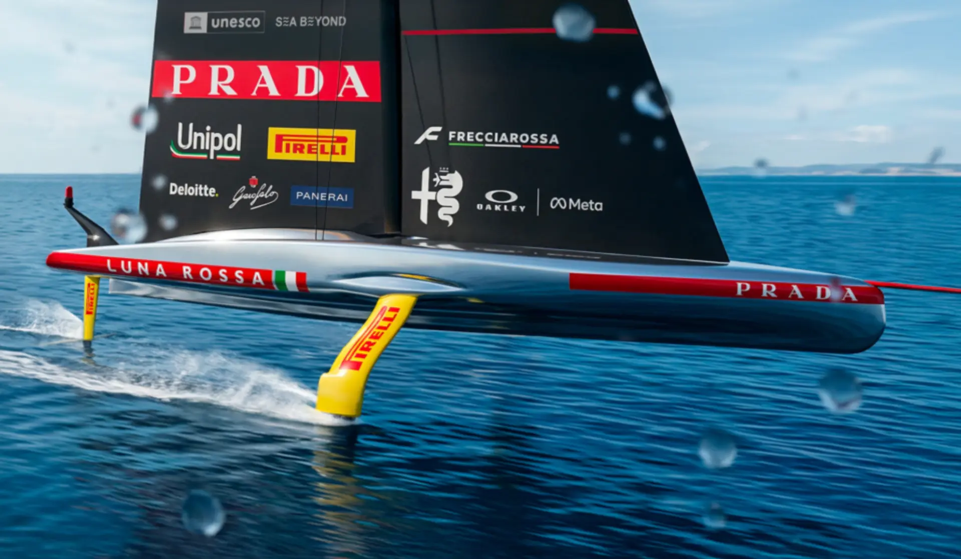 An America's Cup AC75 racing yacht lifted clear of the water on its hydrofoils